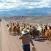 Nainen paimentaa laamoja lähellä San Pedro de Atacamaa